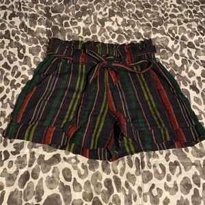 Rasta print shorts size small. Removable belt, stretch waist